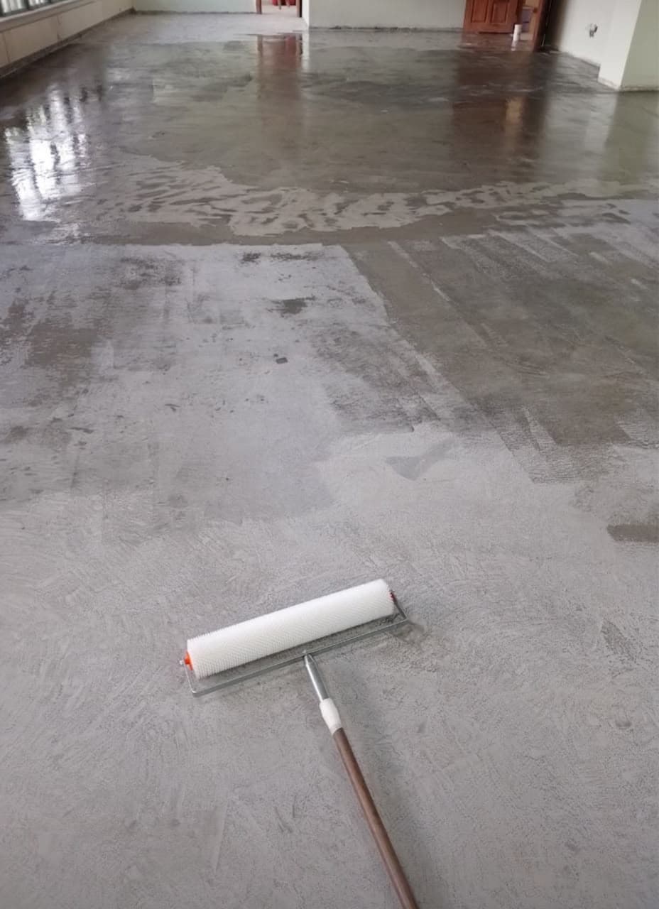 Before: Raw concrete floor needing powerfloating