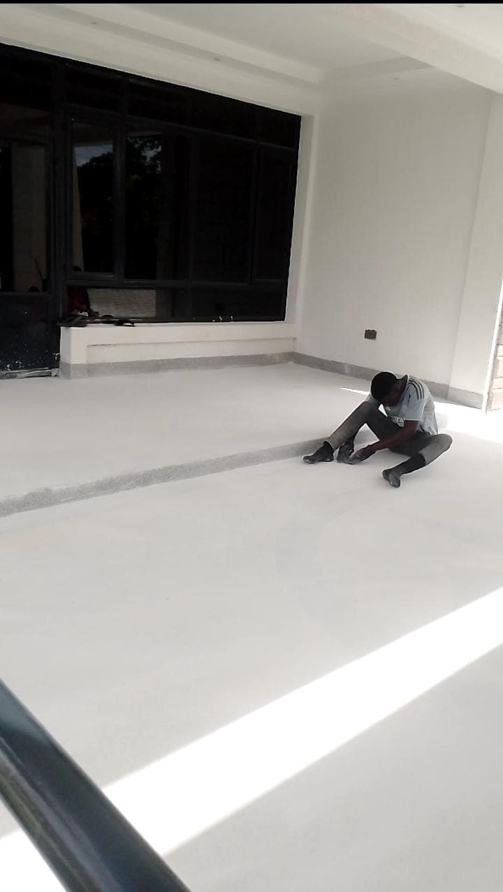 Before: Worn and damaged industrial floor